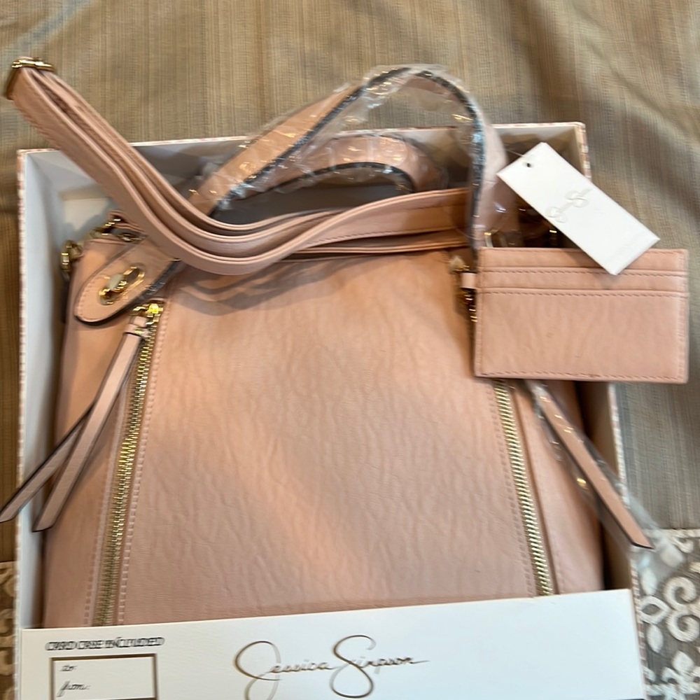 Jessica Simpson powder blush pocketbook. Brand new in box.